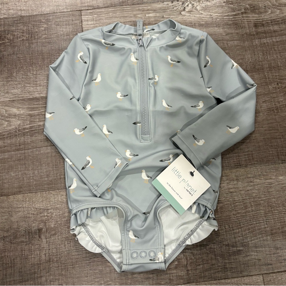 Little planet rashguard